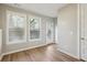 Living room area with natural lighting and hardwood floors at 1095 Tucker Ave # 401, Atlanta, GA 30310