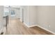 Living room featuring wood floors and an open layout at 1095 Tucker Ave # 401, Atlanta, GA 30310