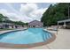 Community swimming pool with lounge chairs at 3973 Woodridge Way, Tucker, GA 30084
