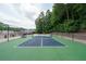 Newly surfaced outdoor tennis court at 3973 Woodridge Way, Tucker, GA 30084