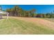 Large backyard with grassy area and wooded backdrop at 91 Pinewood Dr, Covington, GA 30014