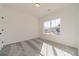 Bright bedroom featuring carpet and a large window at 91 Pinewood Dr, Covington, GA 30014