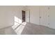 Spacious bedroom with carpet and access to a hallway at 91 Pinewood Dr, Covington, GA 30014