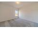 Bright and spacious bedroom with neutral carpeting at 91 Pinewood Dr, Covington, GA 30014