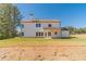 White two-story house with a covered patio at 91 Pinewood Dr, Covington, GA 30014