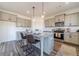 Modern kitchen with stainless steel appliances and island at 91 Pinewood Dr, Covington, GA 30014