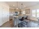 Kitchen island with granite countertop and seating at 91 Pinewood Dr, Covington, GA 30014