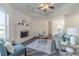 Bright living room with hardwood floors and a cozy fireplace at 91 Pinewood Dr, Covington, GA 30014