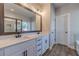 Elegant bathroom with double vanity, large mirror, and modern fixtures at 125 Pinewood Dr, Covington, GA 30014