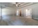 Large bedroom with ceiling fan and ample natural light at 125 Pinewood Dr, Covington, GA 30014