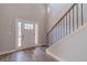 Bright entryway with white door and wood floors at 125 Pinewood Dr, Covington, GA 30014