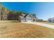 Side view of house highlighting the garage at 125 Pinewood Dr, Covington, GA 30014