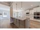 Kitchen with large granite island and modern cabinetry at 125 Pinewood Dr, Covington, GA 30014