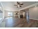 Open living room with hardwood floors, fireplace and access to backyard at 125 Pinewood Dr, Covington, GA 30014