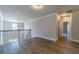 Open loft overlooking the lower level with hardwood floors at 125 Pinewood Dr, Covington, GA 30014