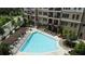 Overhead view of the community pool with ample seating and beautifully maintained grounds at 3621 Vinings Slope Se # 3202, Atlanta, GA 30339