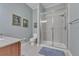 Bathroom featuring a toilet, a shower and a granite countertop at 3621 Vinings Slope Se # 3202, Atlanta, GA 30339