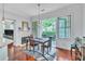 Charming dining area with hardwood floors and access to a private balcony at 3621 Vinings Slope Se # 3202, Atlanta, GA 30339