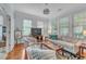 Cozy living room filled with natural light from the large windows and hardwood floors at 3621 Vinings Slope Se # 3202, Atlanta, GA 30339