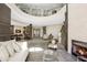 Spacious lounge area with fireplace, seating, and an upper-level view at 3621 Vinings Slope Se # 3202, Atlanta, GA 30339