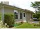 Exterior featuring siding, green spaces, seating, and a door to outside patio at 1007 Sycamore Ln, Villa Rica, GA 30180