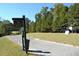 Lake 13 Par 3 golf course with well-maintained green, sign and cart path at 1007 Sycamore Ln, Villa Rica, GA 30180