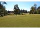 Lush green golf course with manicured grass and winding cart path at 1007 Sycamore Ln, Villa Rica, GA 30180