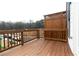 New home deck area features wood railing and divider, perfect for enjoying the outdoors at 326 Olmstead Way # 41, Alpharetta, GA 30022