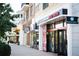 Shops in a retail area with brick and modern facades featuring awnings and pedestrian walkways at 326 Olmstead Way # 41, Alpharetta, GA 30022