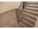 Close up on modern stairs with light wood and black metal railings at 326 Olmstead Way # 41, Alpharetta, GA 30022