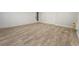The basement has a white painted brick wall with light tiled flooring and a white door at 720 Smithstone Se Rd, Marietta, GA 30067