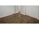 Bedroom featuring new dark floors and ample closet space at 720 Smithstone Se Rd, Marietta, GA 30067