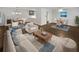 Bright, open-plan living room with modern furnishings and dark wood flooring at 720 Smithstone Se Rd, Marietta, GA 30067