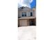 Charming two-story townhome with brick facade and garage at 3405 Ripple Loop # 127, South Fulton, GA 30349