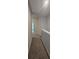 Hallway with neutral paint color and plush carpet that adds warmth and comfort to the space at 3405 Ripple Loop # 127, South Fulton, GA 30349