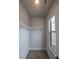 Walk-in closet featuring adjustable wire shelving, neutral paint color, and plush carpet flooring at 3405 Ripple Loop # 127, South Fulton, GA 30349