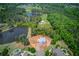 A beautiful estate lot with a new home located on a quiet, wooded street near a pond and mature trees at 2675 Drayton Hall Dr, Buford, GA 30519