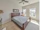 Comfortable bedroom with a large bed, natural light from windows, and neutral decor, creating a cozy atmosphere at 550 Whitlox Nw Rd, Atlanta, GA 30318