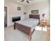 Cozy bedroom featuring a bed, side table, and natural light, creating a welcoming and peaceful retreat at 550 Whitlox Nw Rd, Atlanta, GA 30318