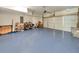Large garage with epoxy flooring, offering ample space for parking and storage, and an overhead garage door at 550 Whitlox Nw Rd, Atlanta, GA 30318