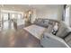 Spacious living room with modern furniture, a rug, and hardwood floors at 550 Whitlox Nw Rd, Atlanta, GA 30318