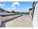 Private rooftop deck with ample space for outdoor seating, overlooking a scenic cityscape at 550 Whitlox Nw Rd, Atlanta, GA 30318