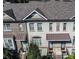 Top-down view of townhouses showcasing architectural details and roofing at 141 Laurel Crest Aly, Johns Creek, GA 30024