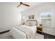 Bright bedroom with a modern ceiling fan, neutral decor, and natural light at 330 Wagon Way, Alpharetta, GA 30009