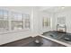 Home gym featuring a mirrored wall, bright light and ample floor space at 330 Wagon Way, Alpharetta, GA 30009