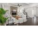 Inviting living room features a stone fireplace, ample seating, and elegant finishes perfect for relaxation and entertaining at 330 Wagon Way, Alpharetta, GA 30009