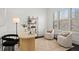 Bright office space featuring large windows, modern furniture, and a stylish shelving unit at 330 Wagon Way, Alpharetta, GA 30009