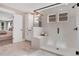 Spa-like bathroom with a glass shower, built-in bench, and marble flooring at 366 Boundless Ln, Canton, GA 30114