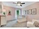 Bedroom features pink walls, white crib, and grey carpet at 366 Boundless Ln, Canton, GA 30114