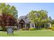 Community clubhouse with gray siding and landscaping at 366 Boundless Ln, Canton, GA 30114